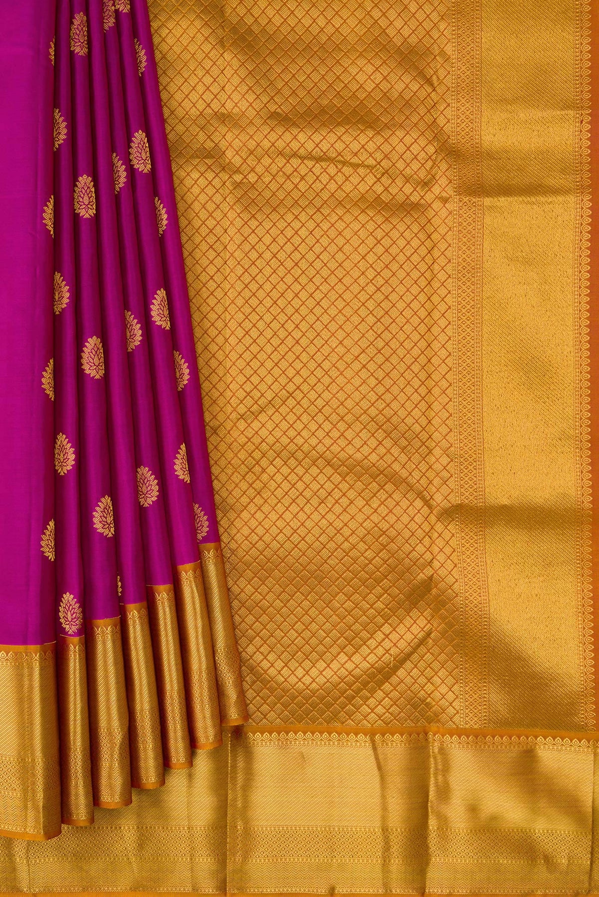 Pleats and pallu of Magenta Dual Tone Kanjivaram Silk Saree with Zari Butta on the body and Zari Border. 