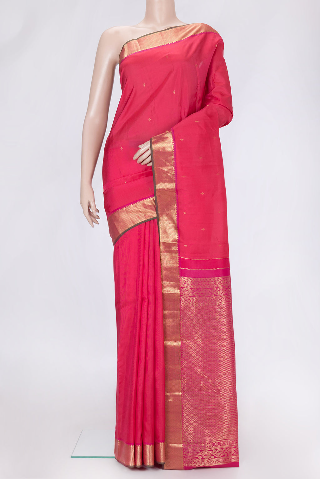Pink Dual Tone Kanjivaram Silk Saree with Zari Butta on the body and Zari Border.  displayed on a mannequin