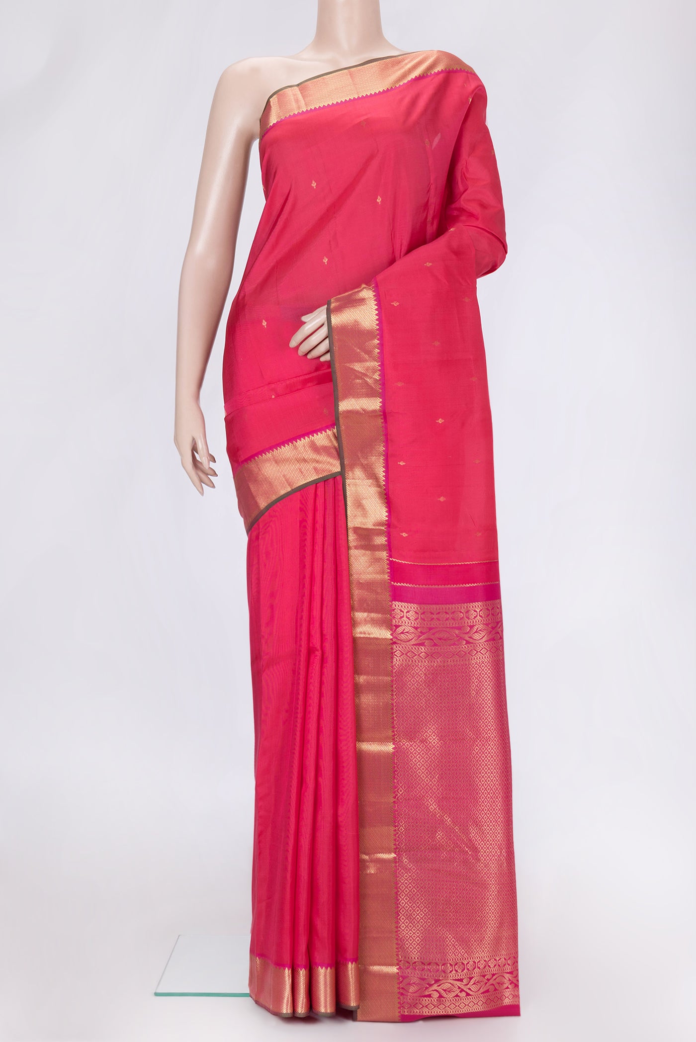 Pink Dual Tone Kanjivaram Silk Saree with Zari Butta on the body and Zari Border.  displayed on a mannequin