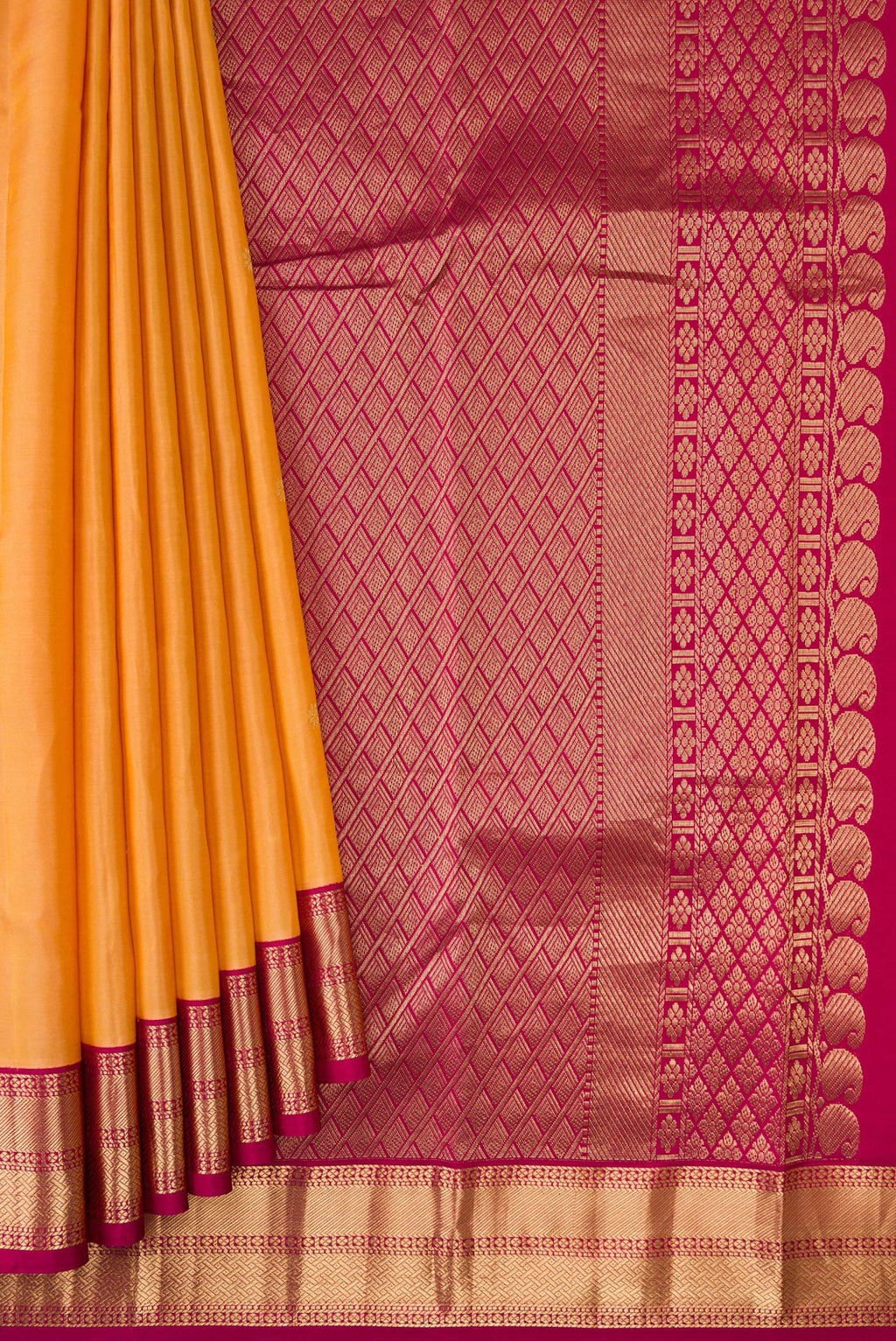 Pleats and pallu of Sandal Dual Tone Kanchipuram Silk Saree with Zari Butta on the body and Zari Border. 