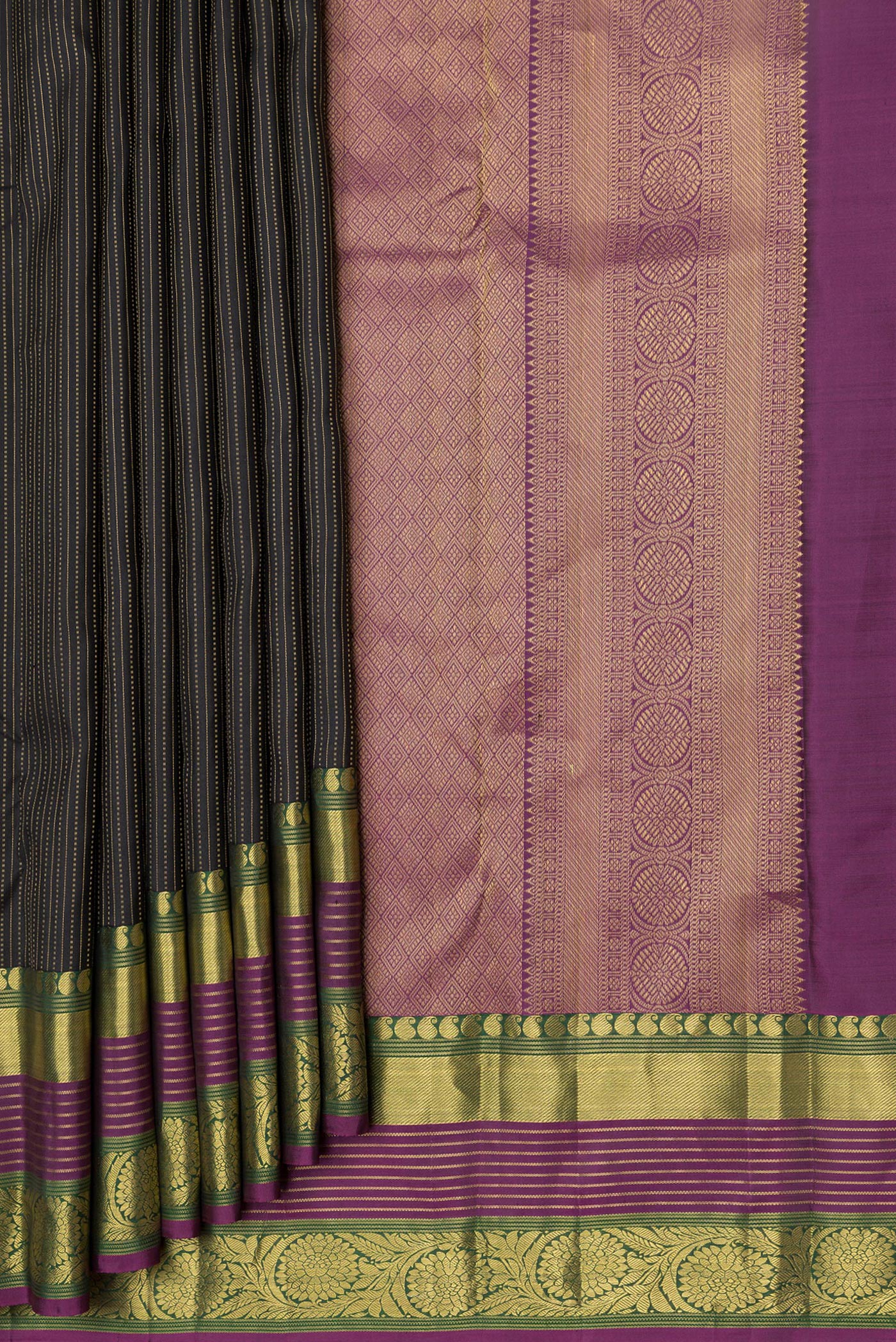 Pleats and pallu of Black Dual Tone Kanjivaram Silk Saree with Stripes on the body and Zari Border. 