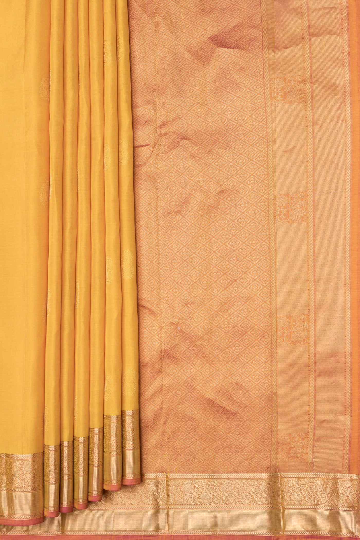 Pleats and pallu of Yellow Dual Tone Kanchipuram Silk Saree with Zari Butta on the body and Zari Border. 