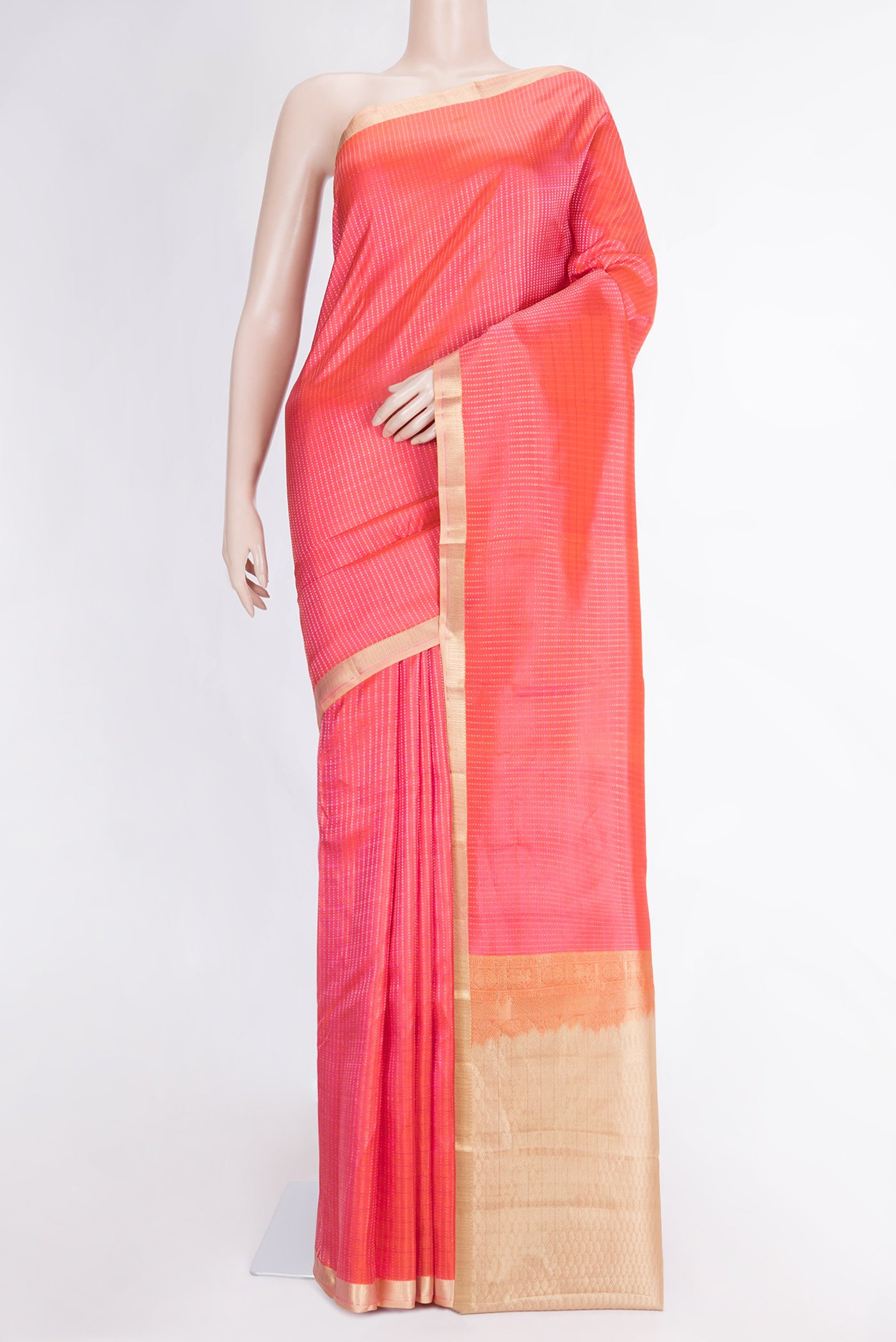 Peach Dual Tone Kanchipuram Silk Saree with Stripes on the body and Zari Border.  displayed on a mannequin
