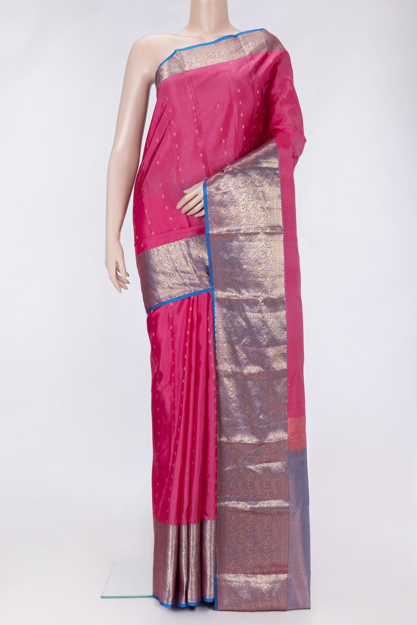 Pink Dual Tone Kanchipuram Silk Saree with Zari Butta on the body and Zari Border.  displayed on a mannequin
