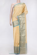 Sandal Dual Tone Kanchipuram Silk Saree with Zari Butta on the body and Zari Border.  displayed on a mannequin