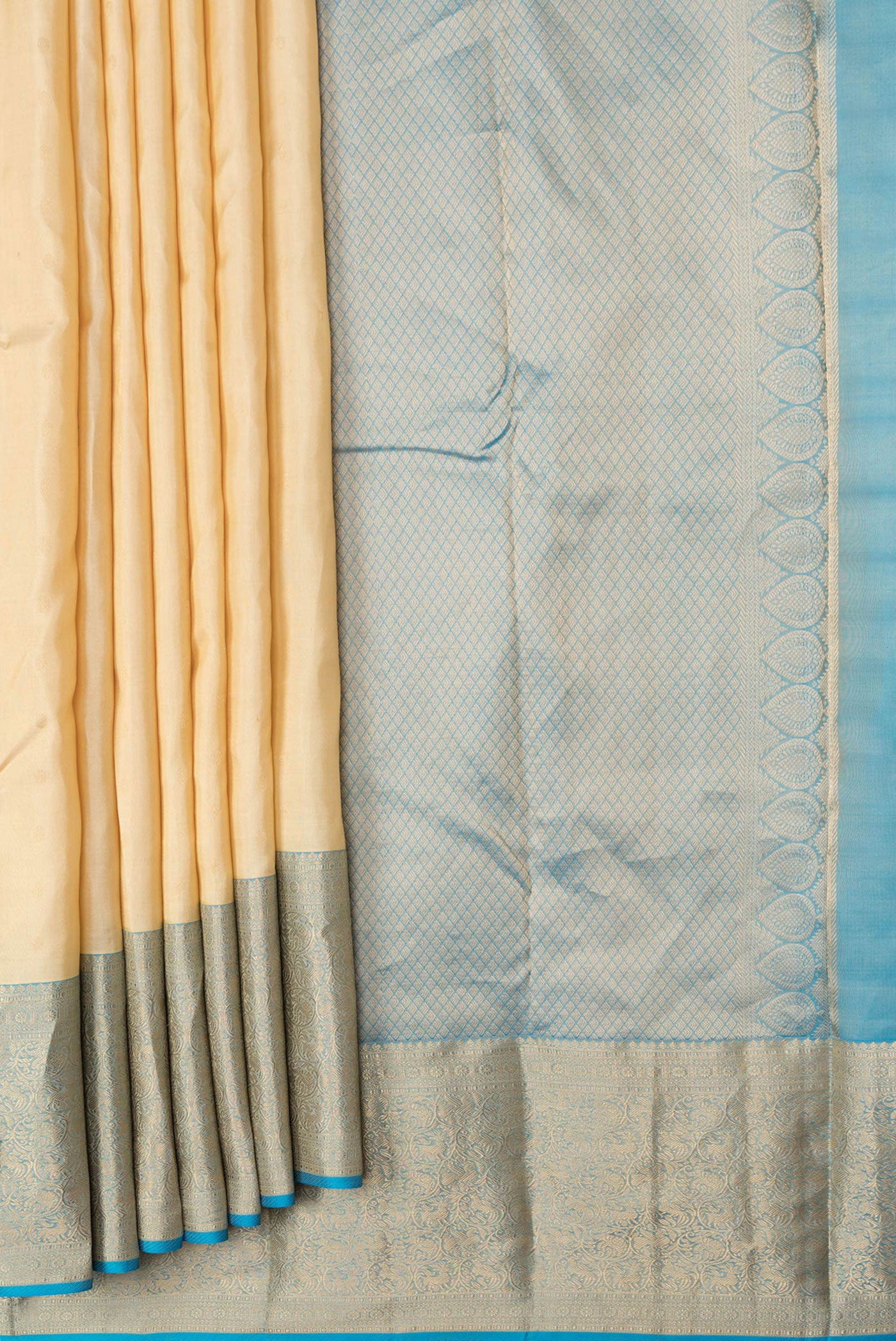 Pleats and pallu of Sandal Dual Tone Kanchipuram Silk Saree with Zari Butta on the body and Zari Border. 
