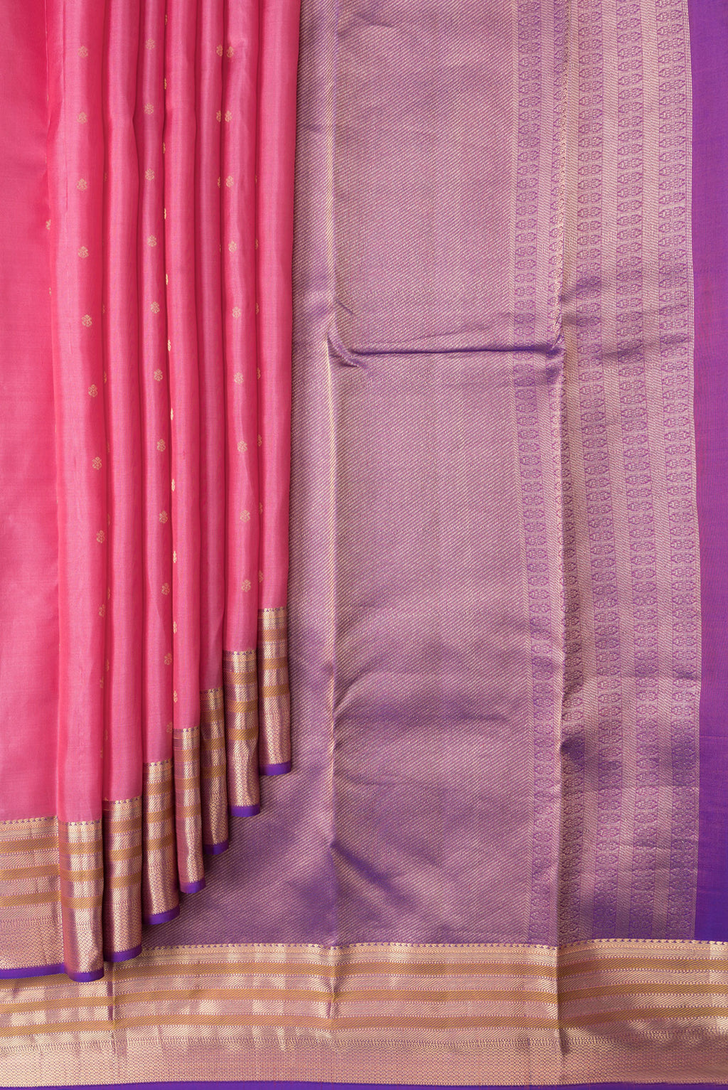 Pleats and pallu of Pink Dual Tone Kanchipuram Silk Saree with Zari Butta on the body and Zari Border. 