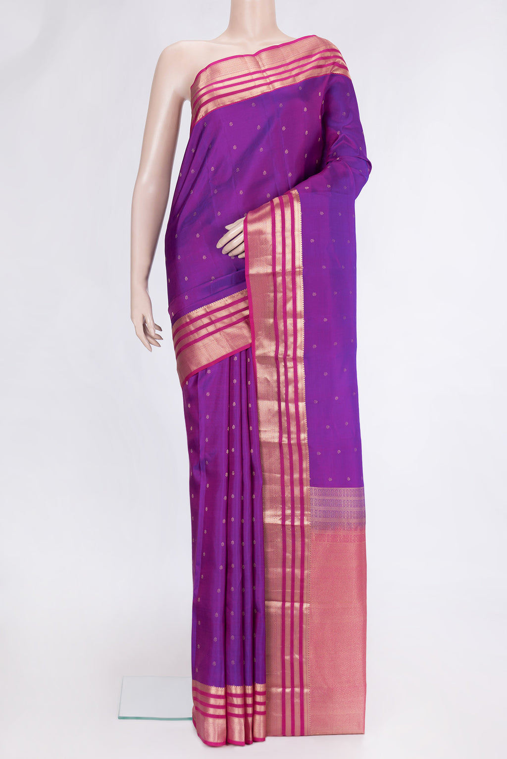 Purple Dual Tone Kanchipuram Silk Saree with Zari Butta on the body and Zari Border.  displayed on a mannequin