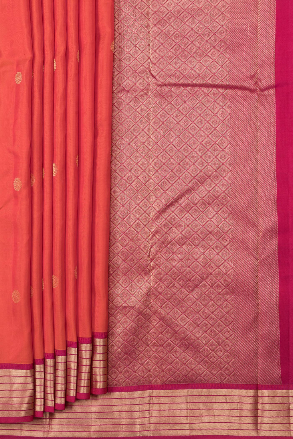 Pleats and pallu of Orange Dual Tone Kanchipuram Silk Saree with Zari Butta on the body and Zari Border. 