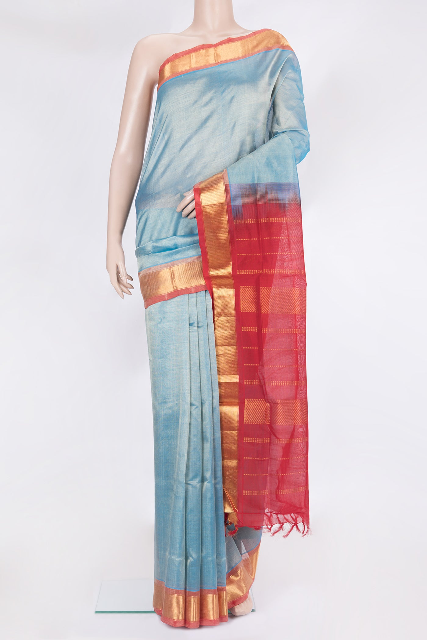 Light Blue Silk Cotton Saree with Plain Body and Zari Border.  displayed on a mannequin