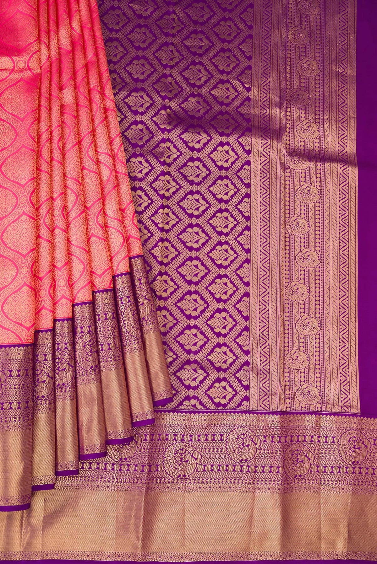 Pleats and pallu of Pink Kanjivaram Silk Saree with Zari Brocade on the body and Zari Border. 
