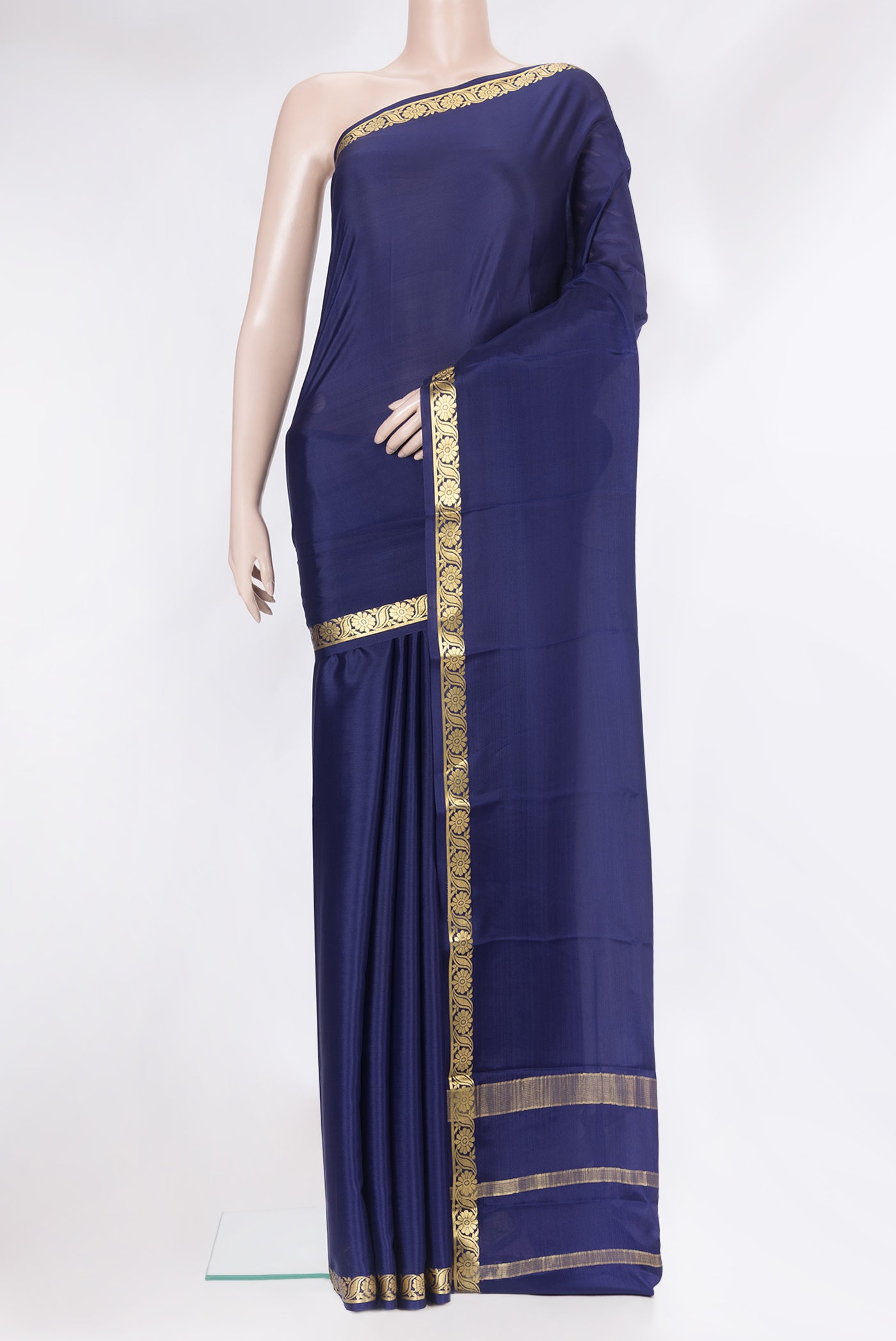 Navy Blue Mysore Silk Saree with Plain Body and Zari Border.  displayed on a mannequin