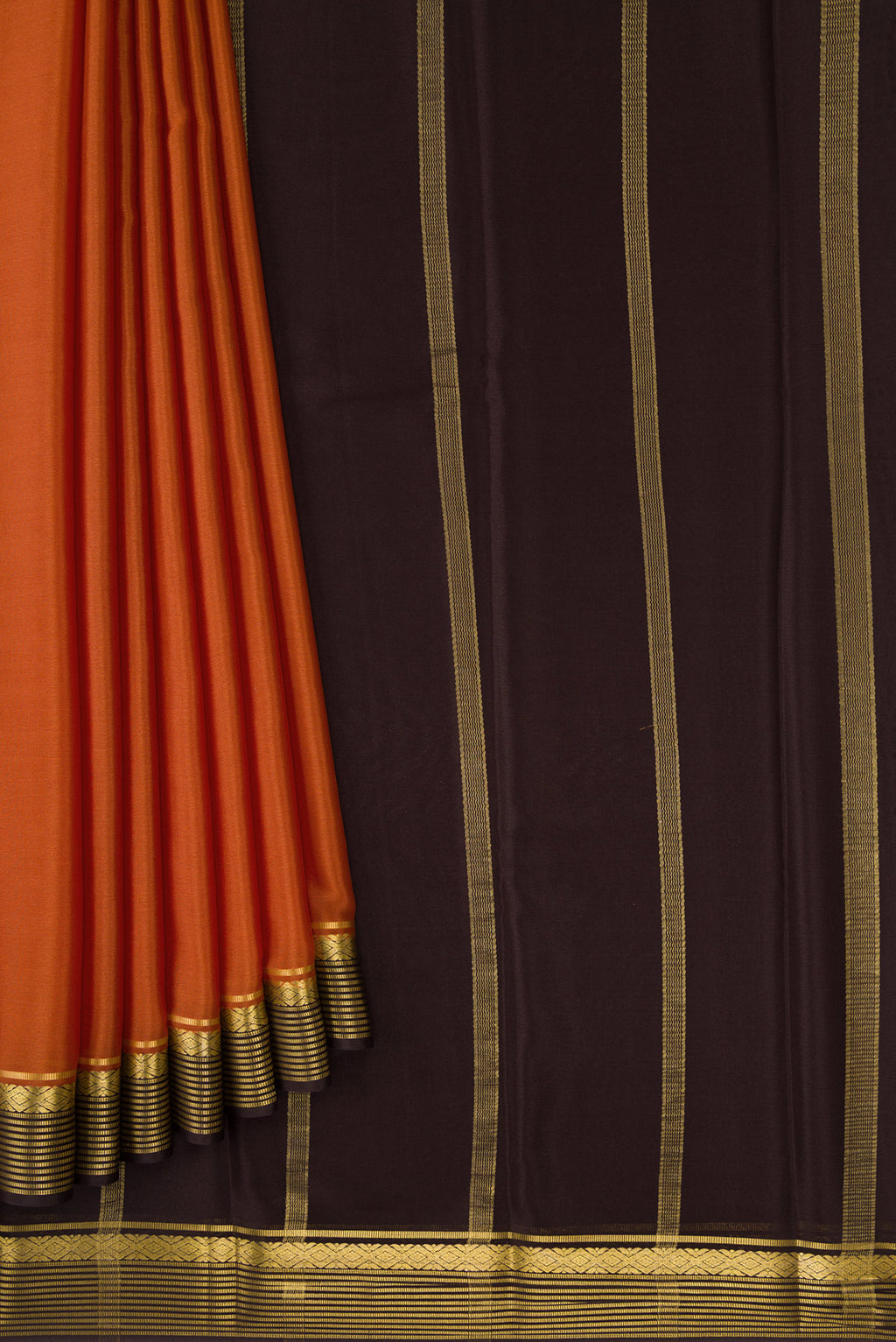Pleats and pallu of Rust Dual Tone Mysore Crepe Saree with Plain Body and Zari Border. 