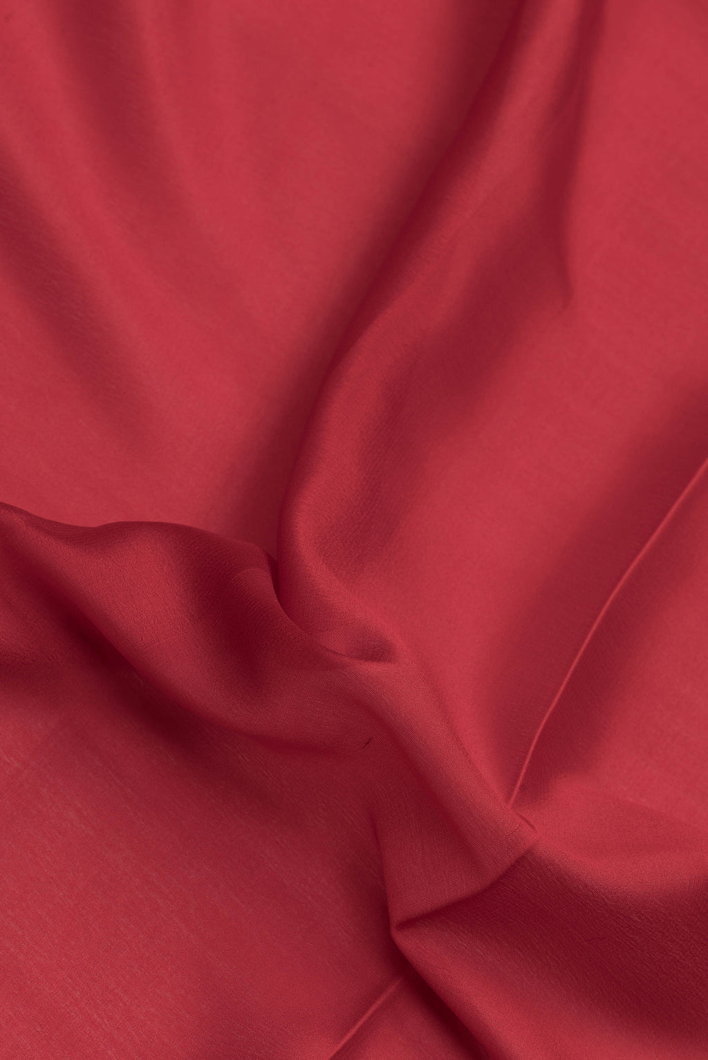 Close up of Red Dual Tone Mysore Silk Saree with Plain Body and Zari Border.  displaying folds