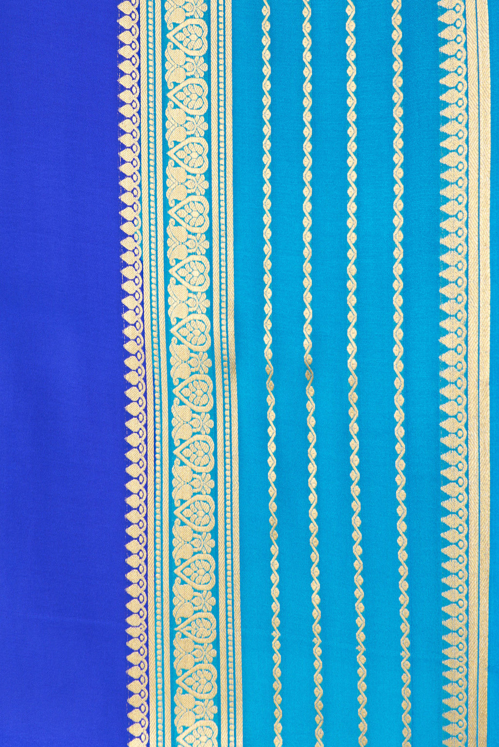 Border image of Royal Blue Dual Tone Mysore Crepe Saree with Plain Body and Zari Border. 