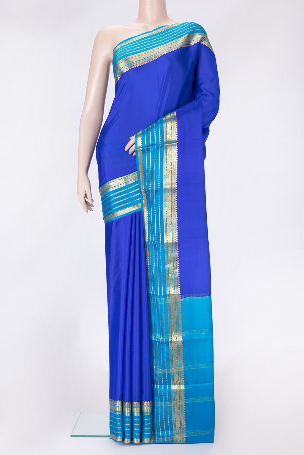 Royal Blue Dual Tone Mysore Crepe Saree with Plain Body and Zari Border.  displayed on a mannequin