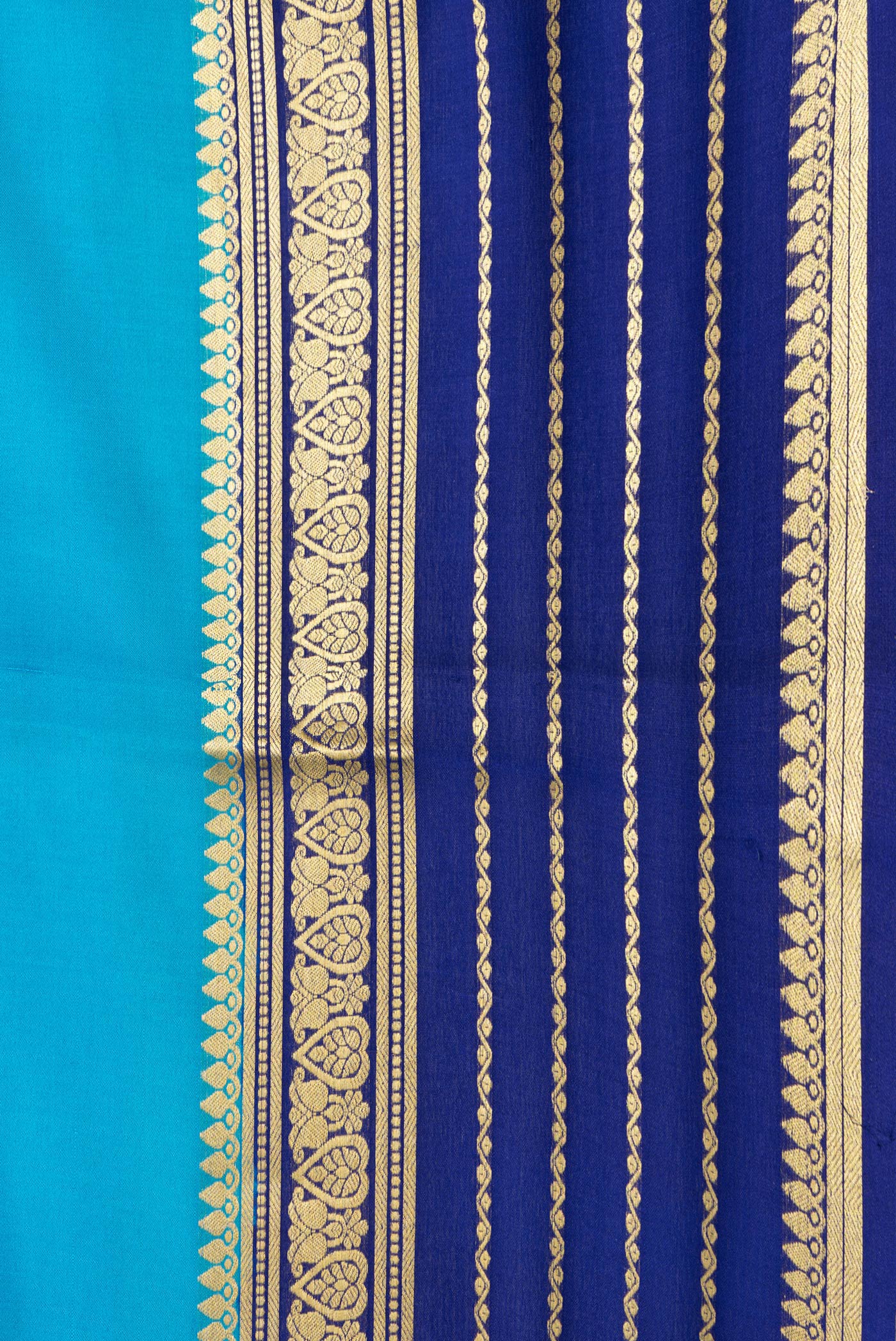 Border image of Sky Blue Dual Tone Mysore Silk Saree with Plain Body and Zari Border. 