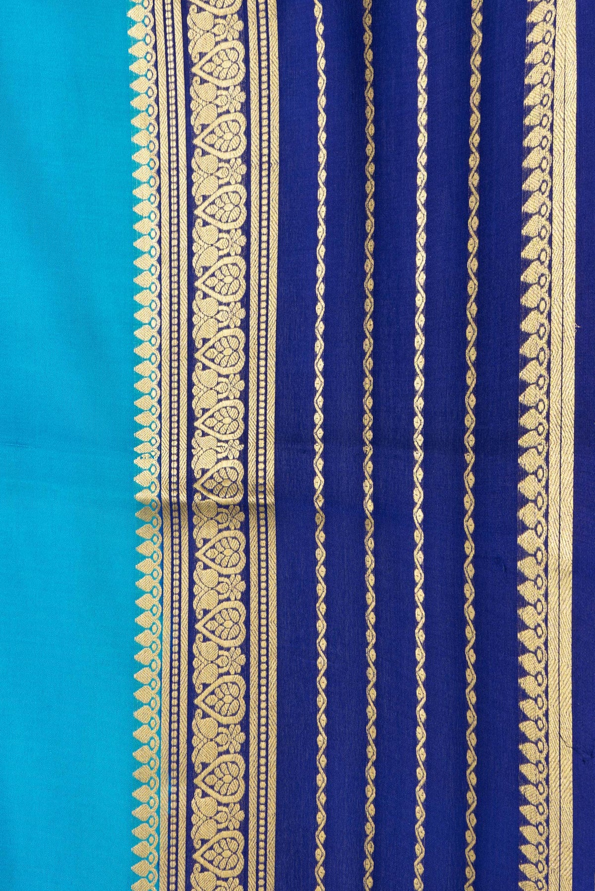 Border image of Sky Blue Dual Tone Mysore Silk Saree with Plain Body and Zari Border. 