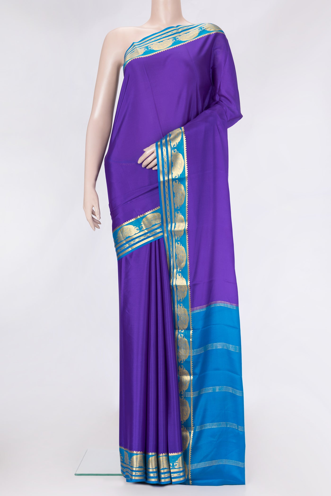 Royal Blue Dual Tone Mysore Silk Saree with Plain Body and Zari Border.  displayed on a mannequin