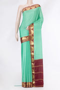 Light Green Dual Tone Mysore Silk Saree with Plain Body and Zari Border.  displayed on a mannequin