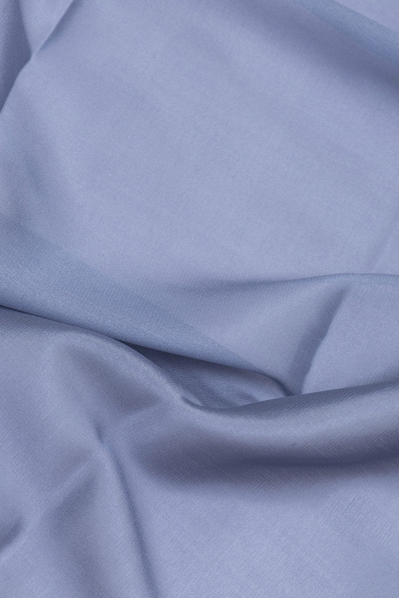 Close up of Grey Mysore Crepe Saree with Plain Body and Zari Border.  displaying folds