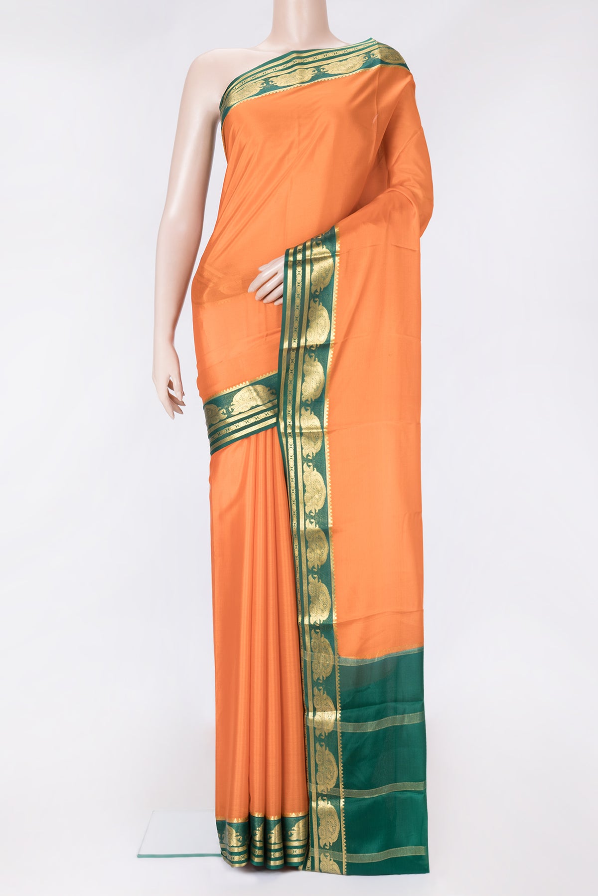 Peach Dual Tone Mysore Crepe Saree with Plain Body and Zari Border.  displayed on a mannequin