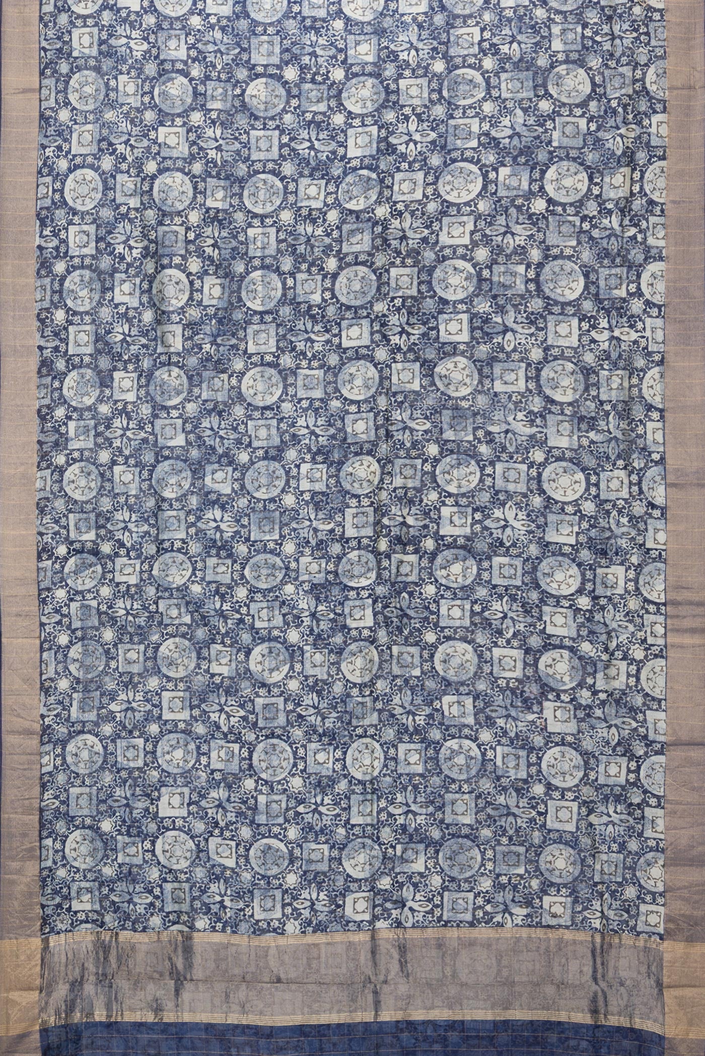 Flat view of Navy Blue Dual Tone Chanderi Silk Saree with Printed design on the body and Zari Border. 