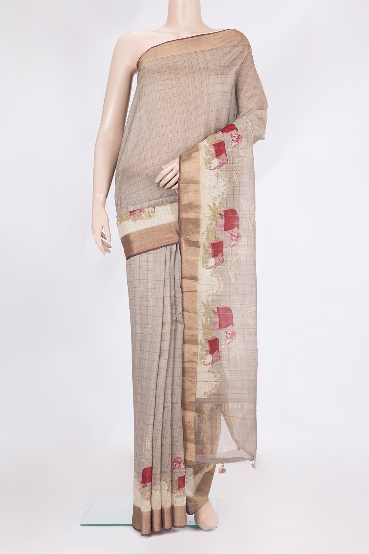 Pure Silk Dark Beige Dual Tone Chanderi Saree with Printed design on the body and Fancy Border.  displayed on a mannequin