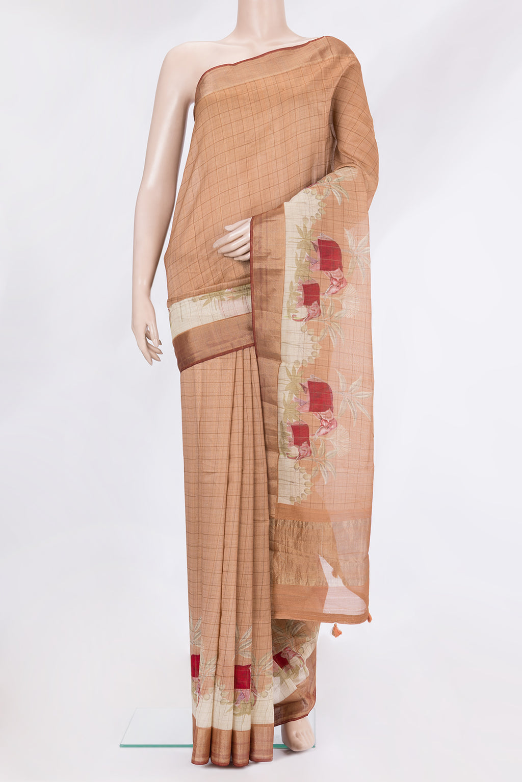 Golden Peach Dual Tone Chanderi Silk Saree with Printed design on the body and Fancy Border.  displayed on a mannequin