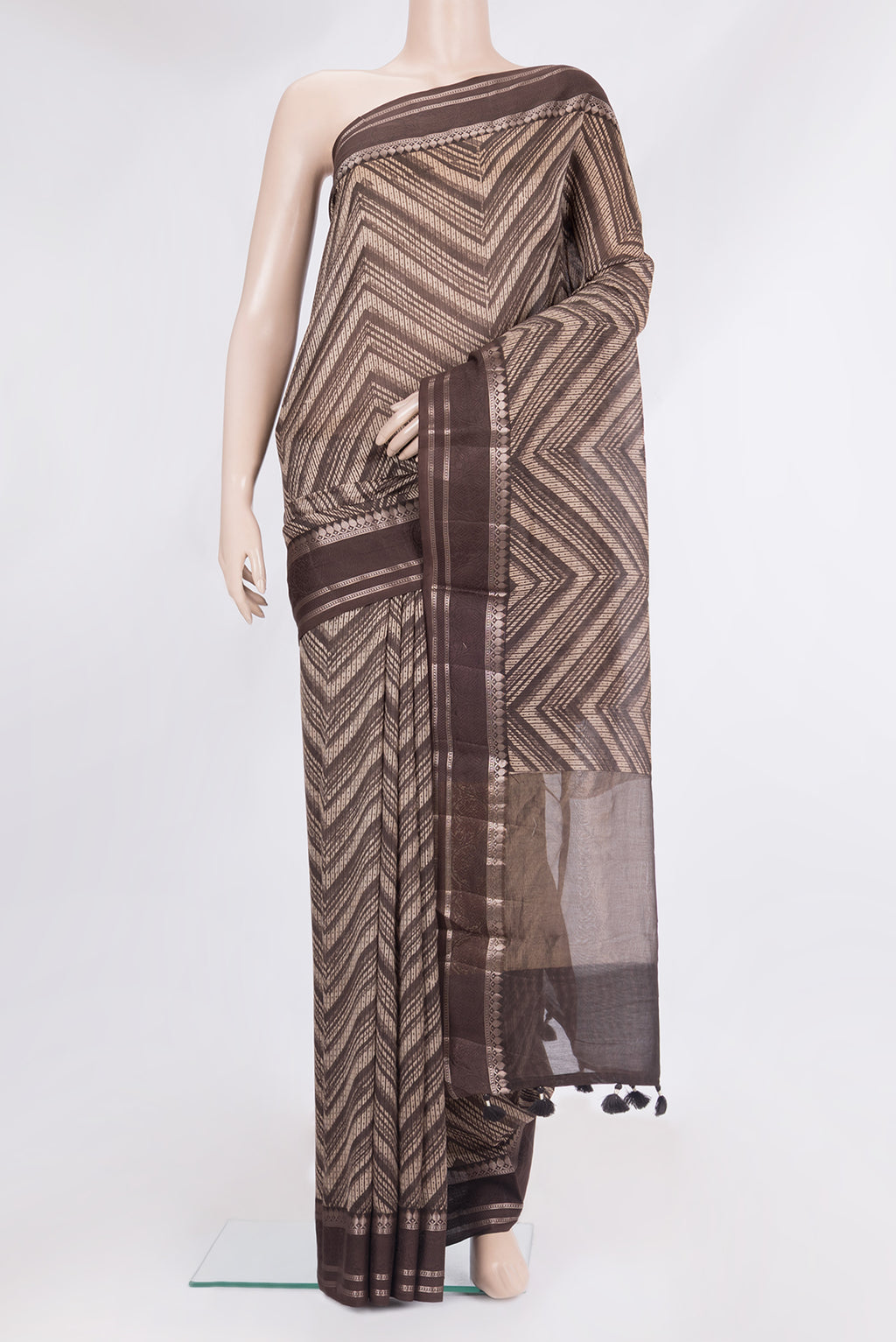 Pure Silk Coffee Brown Dual Tone Chanderi Saree with Printed design on the body and Zari Border.  displayed on a mannequin