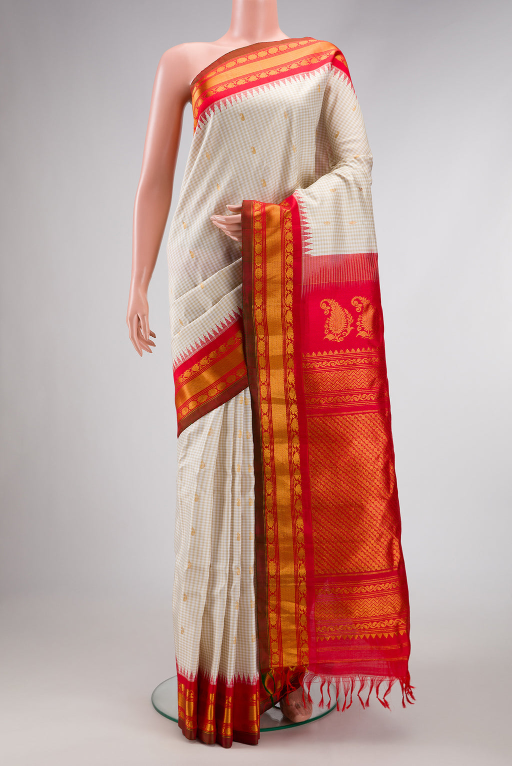 Off White Dual Tone Gadwal Silk Saree with Zari Butta on the body and Zari Border.  displayed on a mannequin