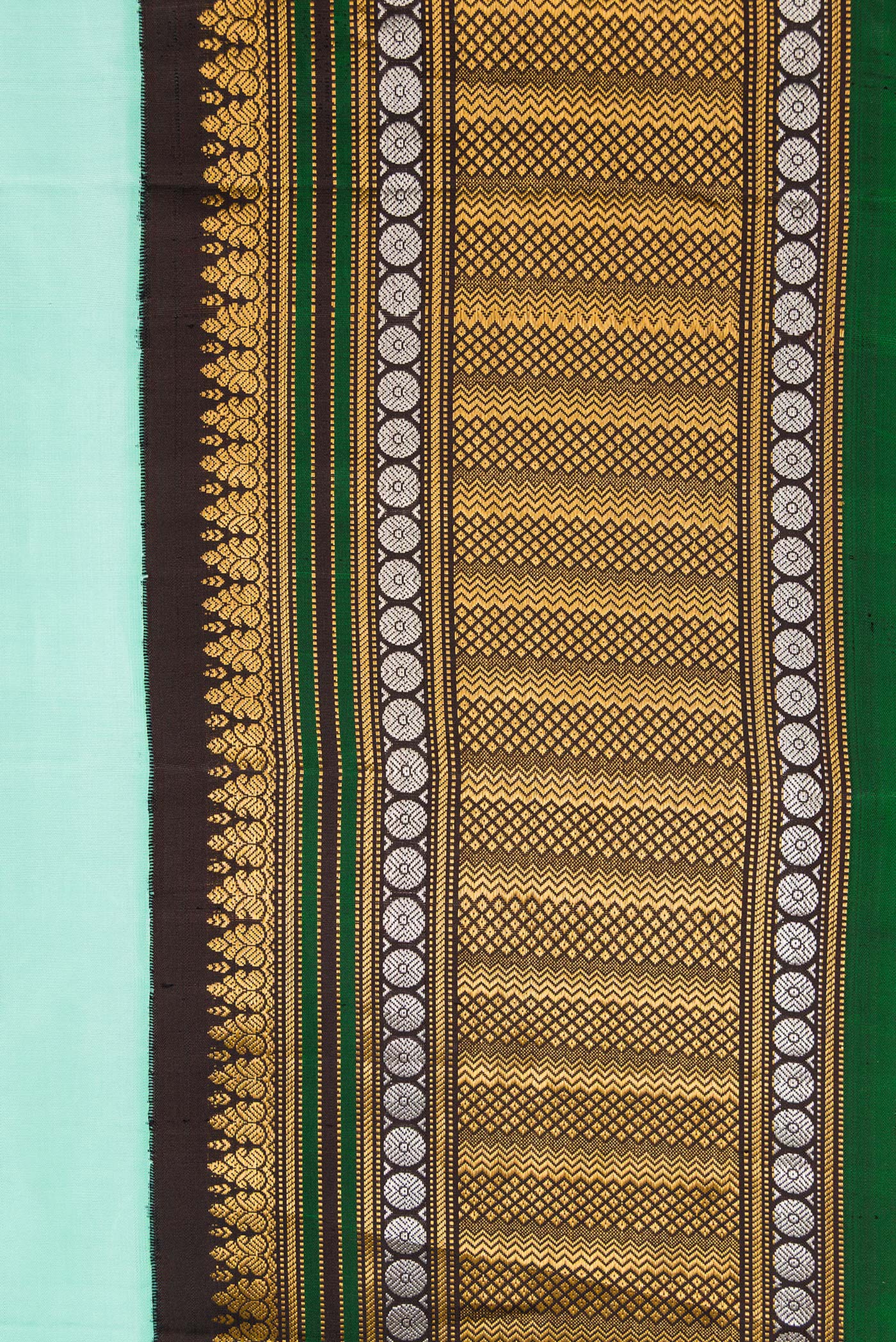 Border image of Sky Blue Dual Tone Gadwal Silk Saree with Zari Butta on the body and Zari Border. 