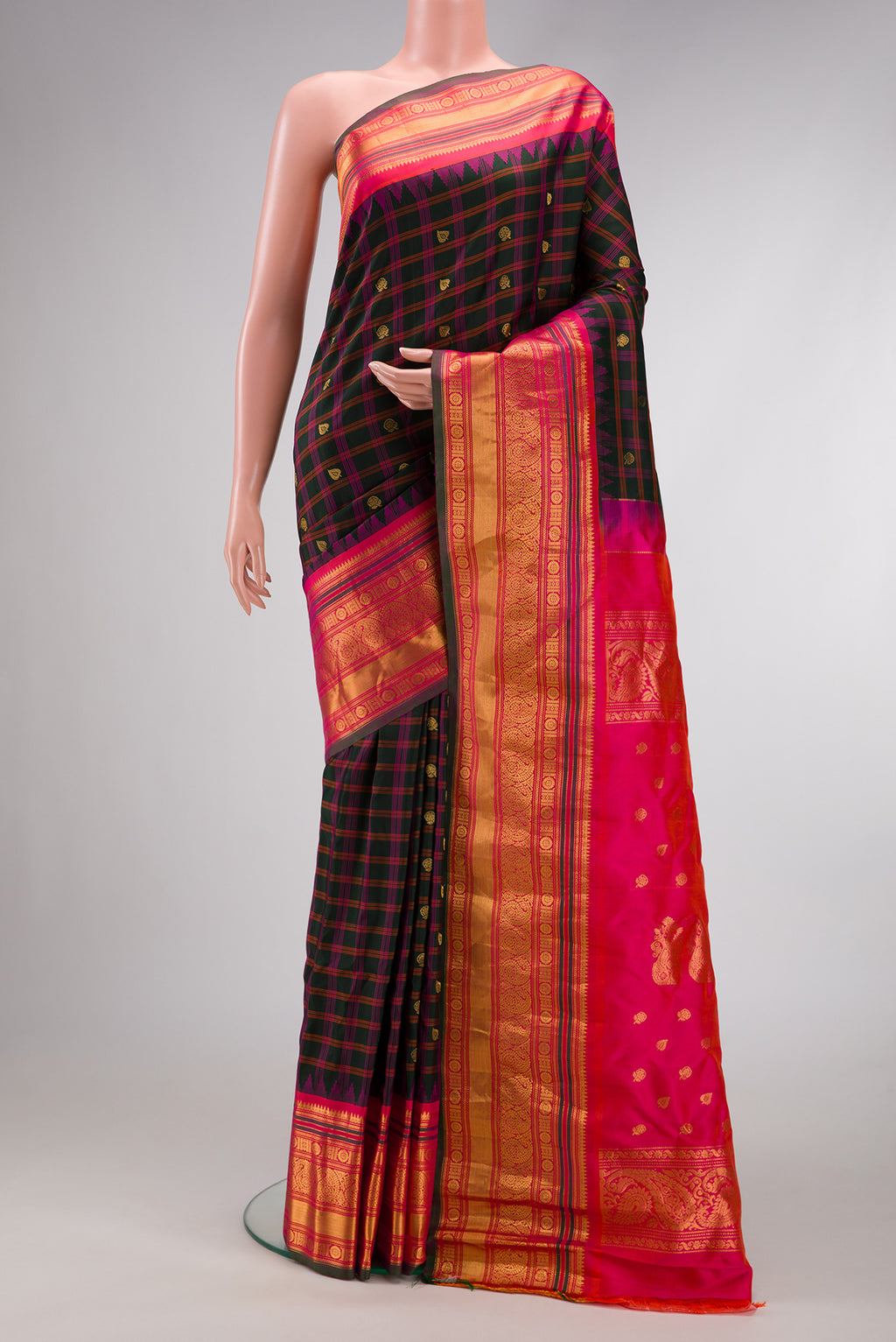 Black Dual Tone Gadwal Silk Saree with Checked design on the body and Zari Border.  displayed on a mannequin