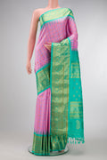 Pink Dual Tone Gadwal Silk Saree with Checked design on the body and Temple Border.  displayed on a mannequin