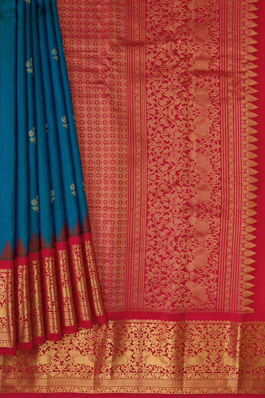 Pleats and pallu of Peacock Blue Dual Tone Gadwal Silk Saree with Zari Butta on the body and Zari Border. 