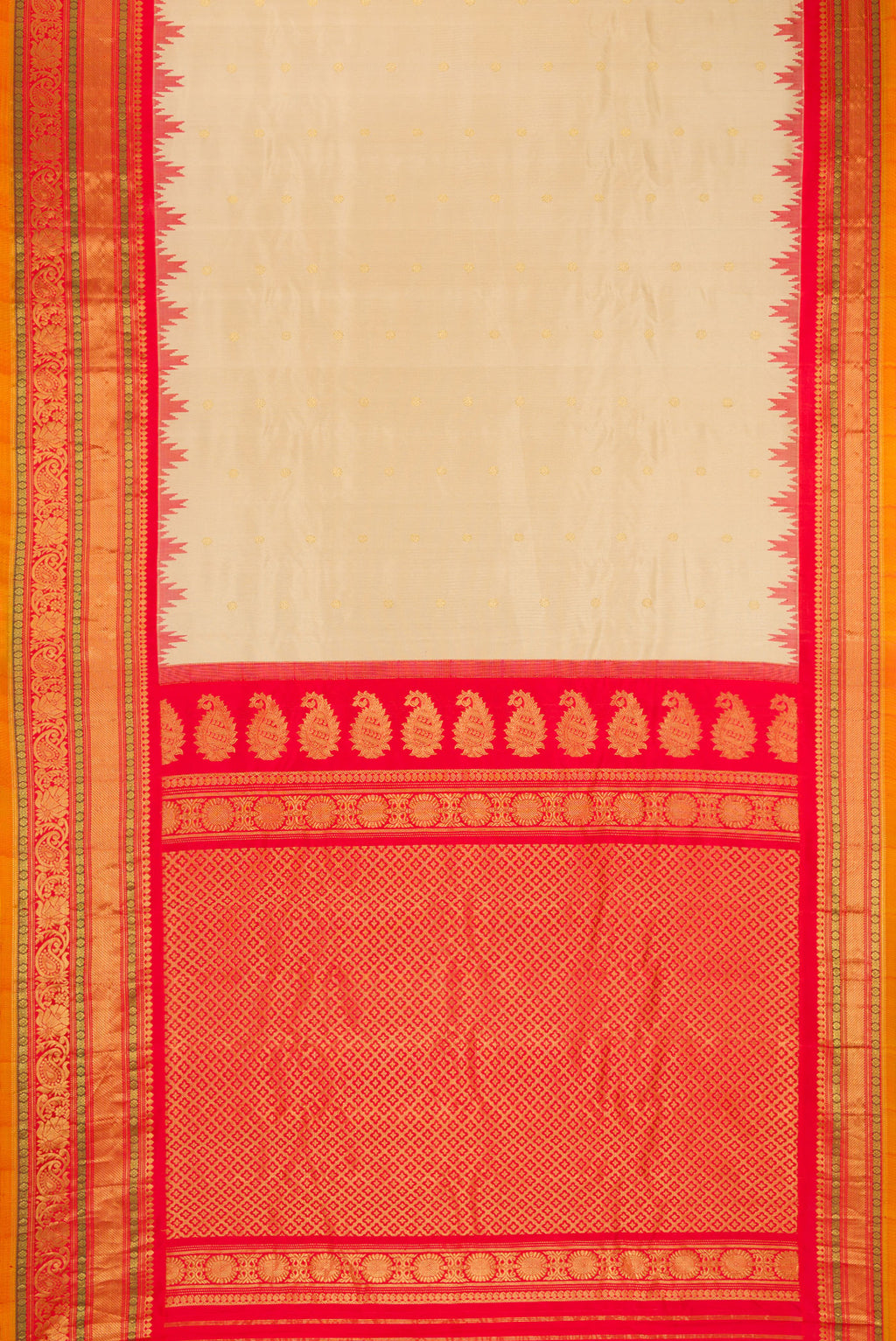Flat view of Dark Beige Gadwal Silk Saree with Zari Butta on the body and Zari Border. 