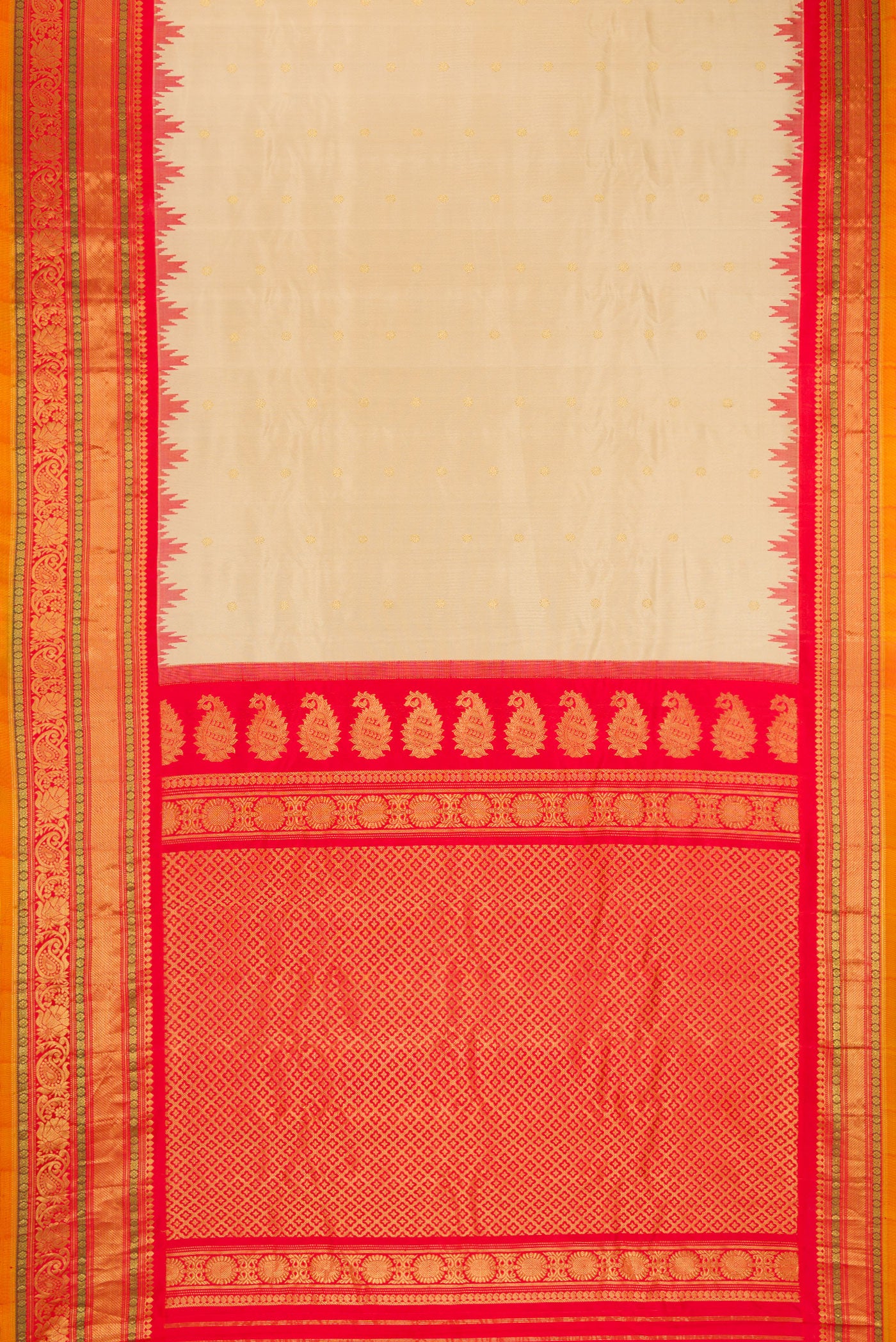 Flat view of Dark Beige Gadwal Silk Saree with Zari Butta on the body and Zari Border. 