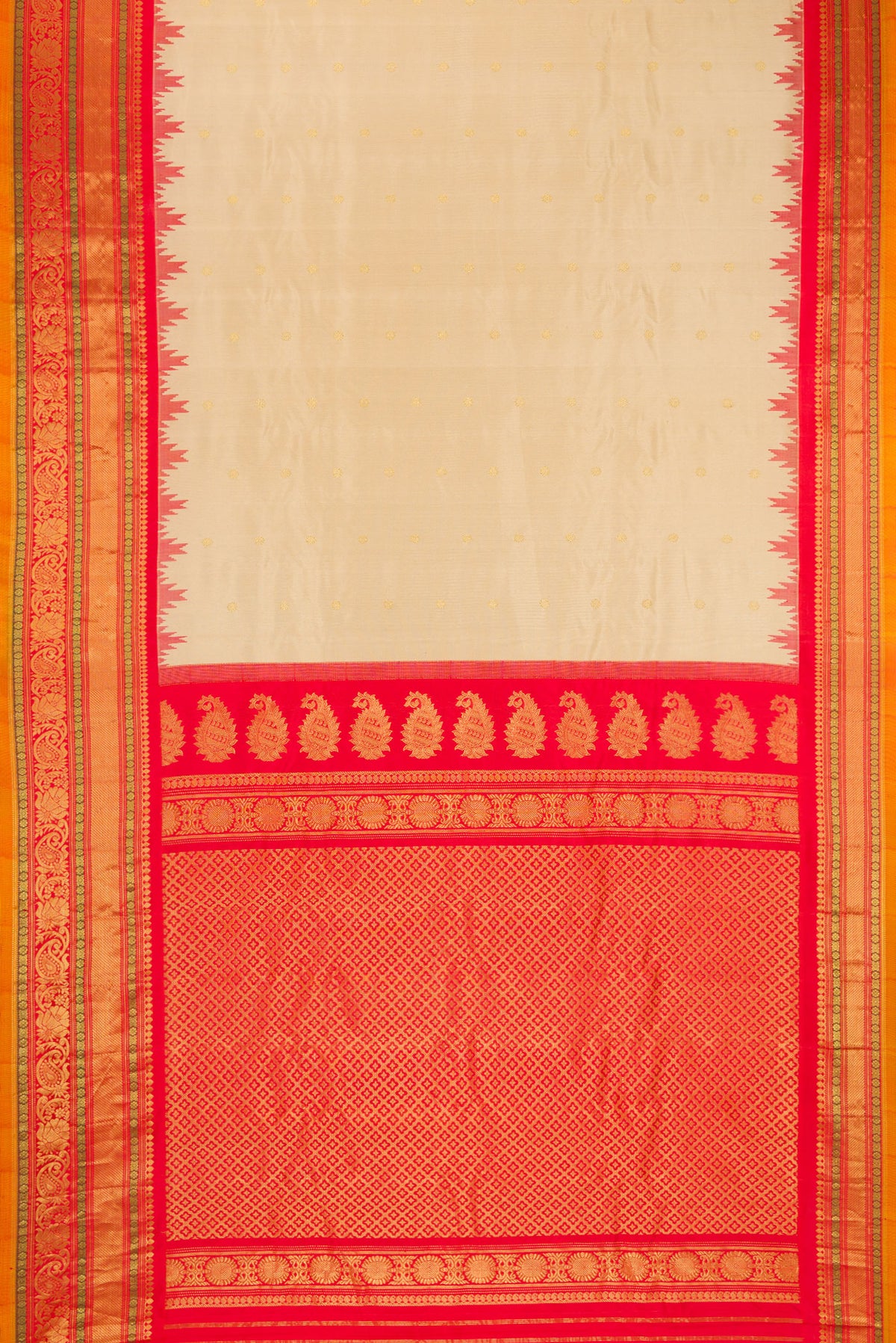 Flat view of Dark Beige Gadwal Silk Saree with Zari Butta on the body and Zari Border. 