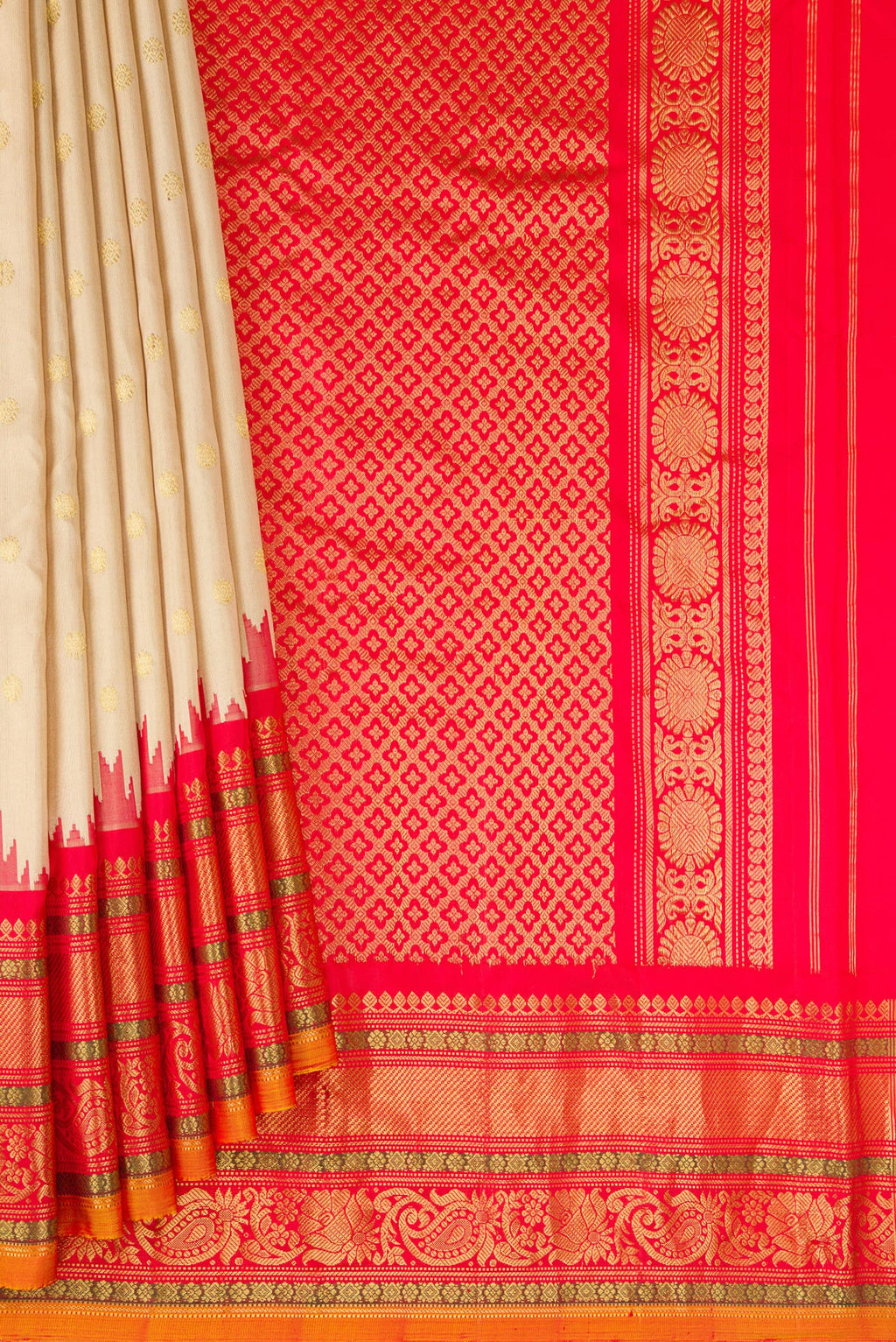 Pleats and pallu of Dark Beige Gadwal Silk Saree with Zari Butta on the body and Zari Border. 