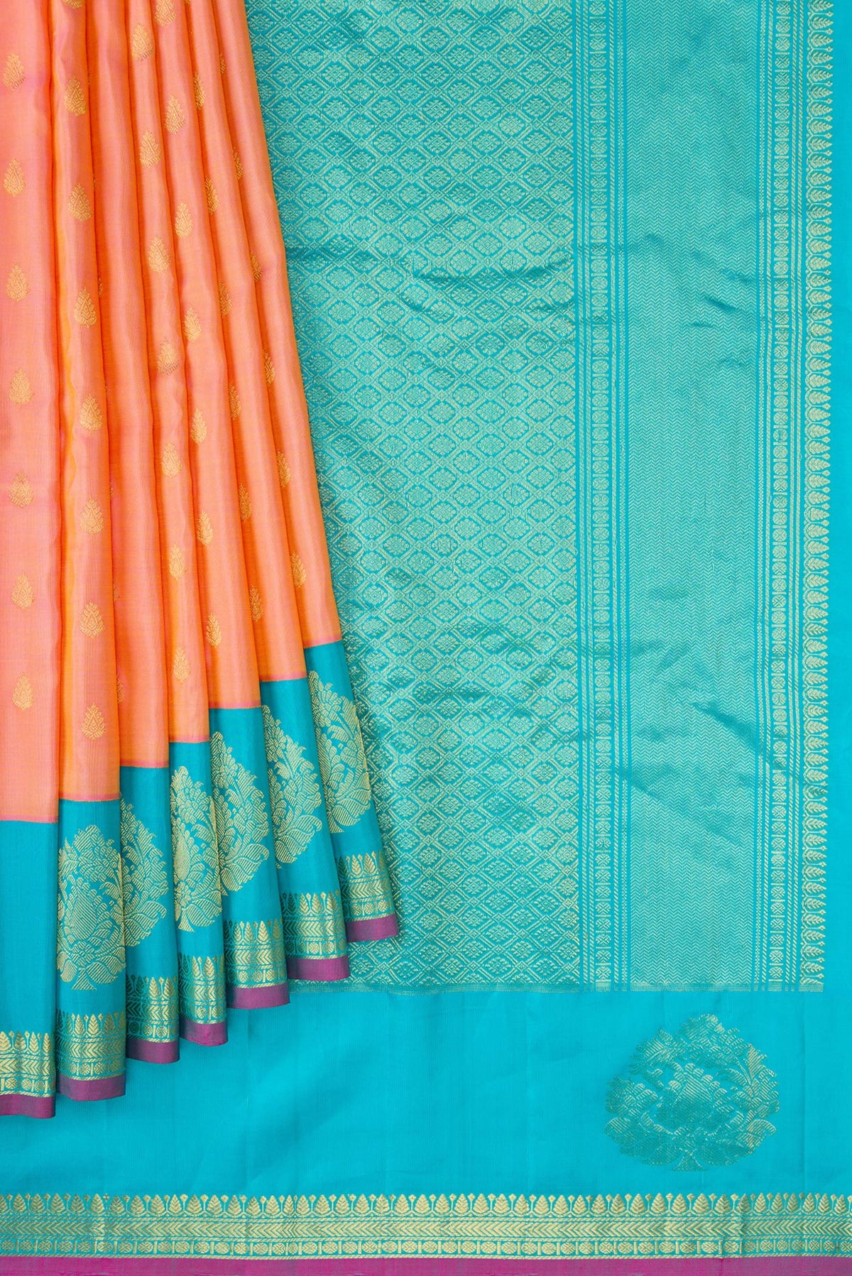 Pleats and pallu of Golden Peach Dual Tone Gadwal Silk Saree with Zari Butta on the body and Fancy Border. 