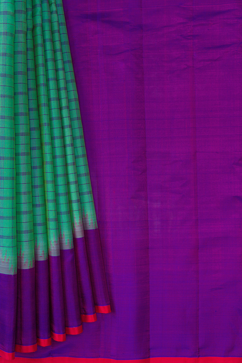 Pleats and pallu of Sea Green Dual Tone Gadwal Silk Saree with Checked design on the body and Temple Border. 