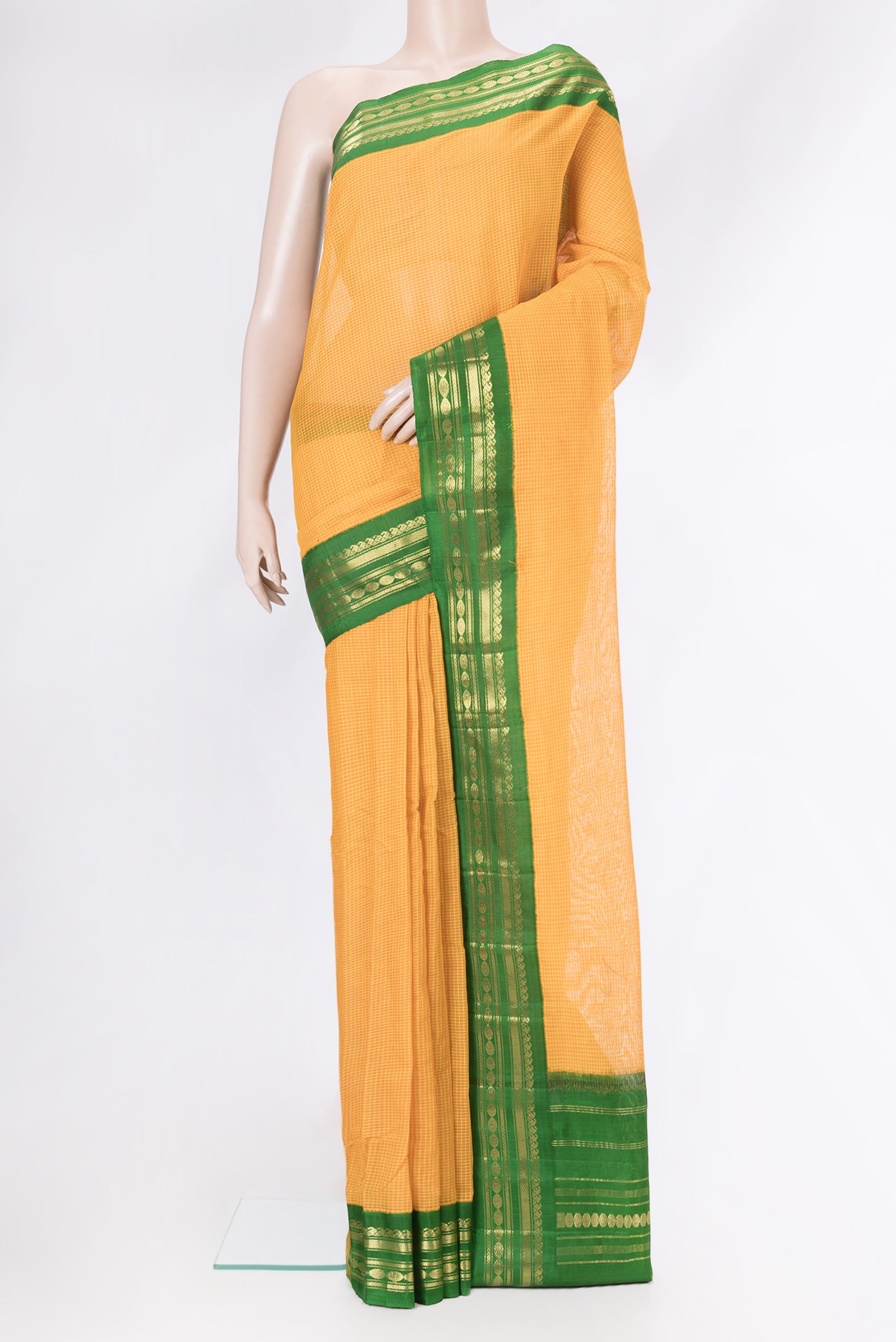 Yellow Dual Tone Gadwal cotton Saree with Checked design on the body and Zari Border.  displayed on a mannequin