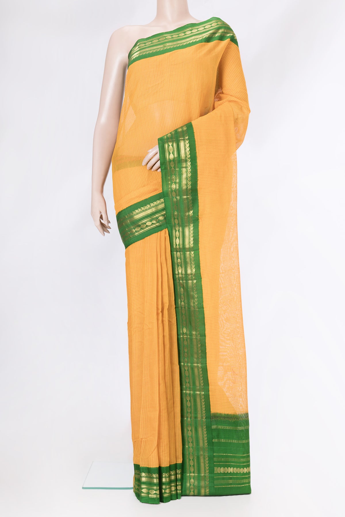 Yellow Dual Tone Gadwal cotton Saree with Checked design on the body and Zari Border.  displayed on a mannequin