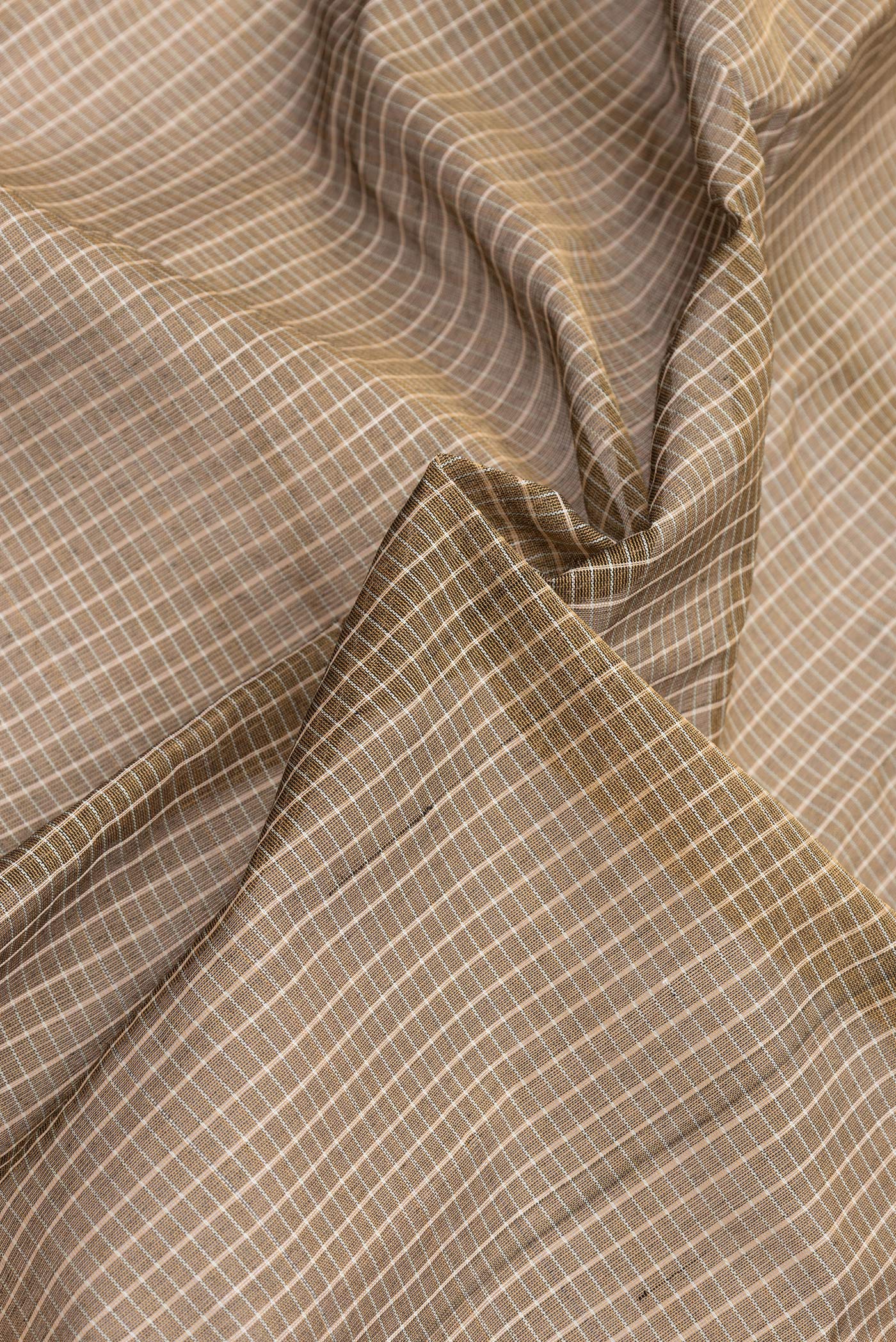 Close up of Mehandi Green Dual Tone Gadwal cotton Saree with Checked design on the body and Zari Border.  displaying folds