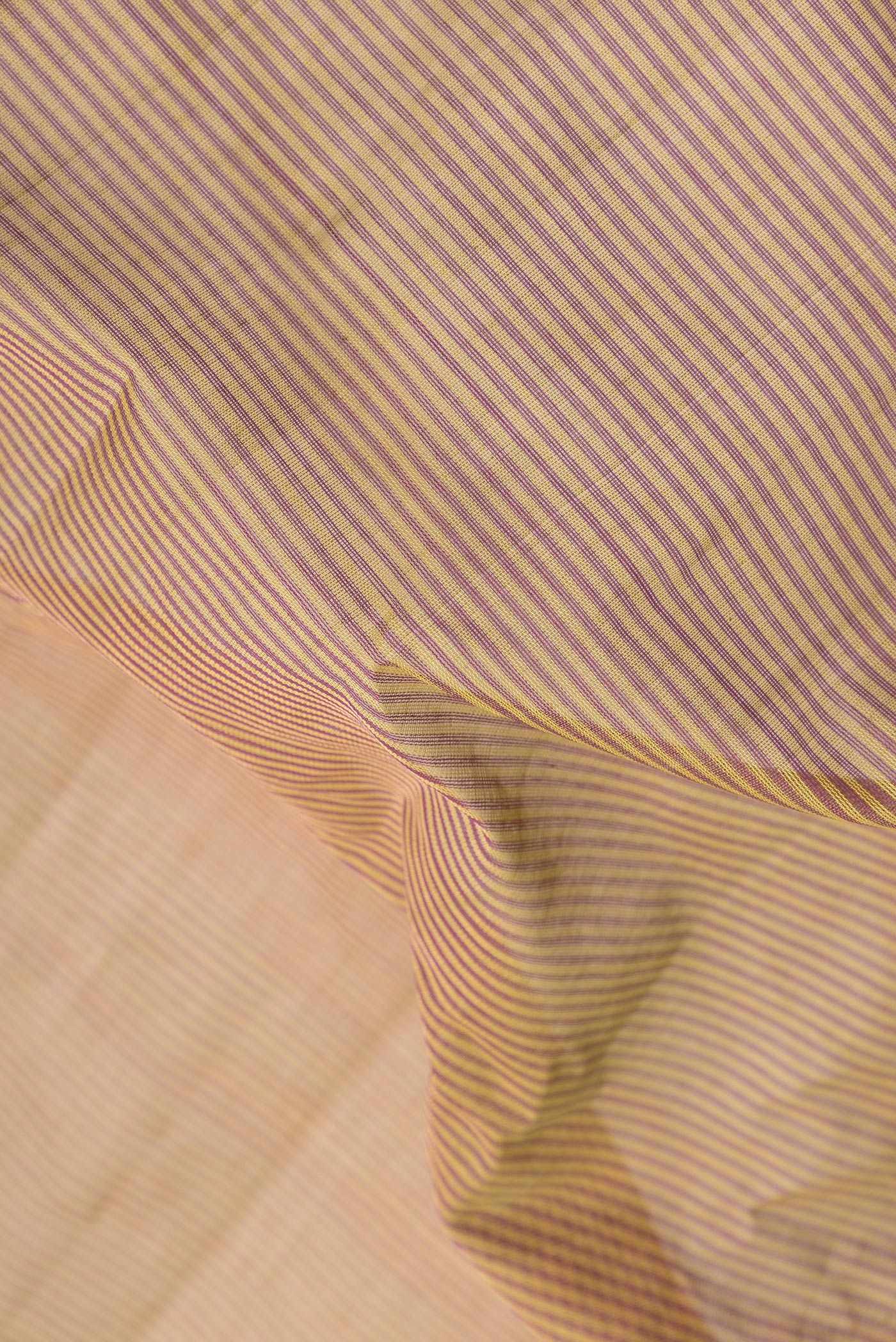 Close up of Mehandi Green Dual Tone Gadwal Silk Saree with Stripes on the body and Zari Border.  displaying folds