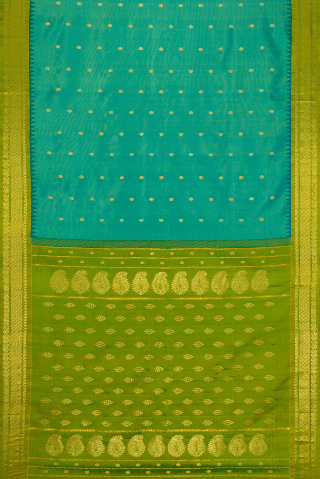 Flat view of Green Dual Tone Gadwal Silk Saree with Zari Butta on the body and Zari Border. 