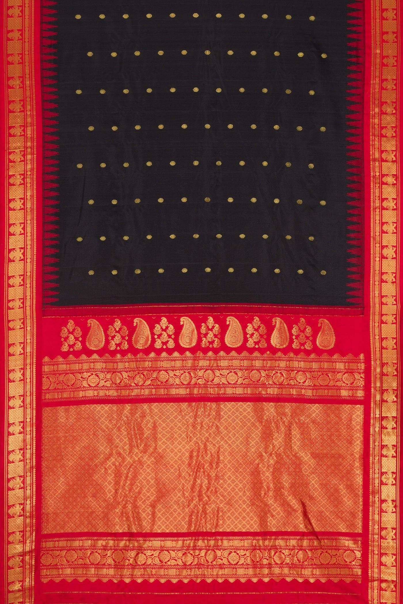 Flat view of Black Dual Tone Gadwal Silk Saree with Zari Butta on the body and Zari Border. 