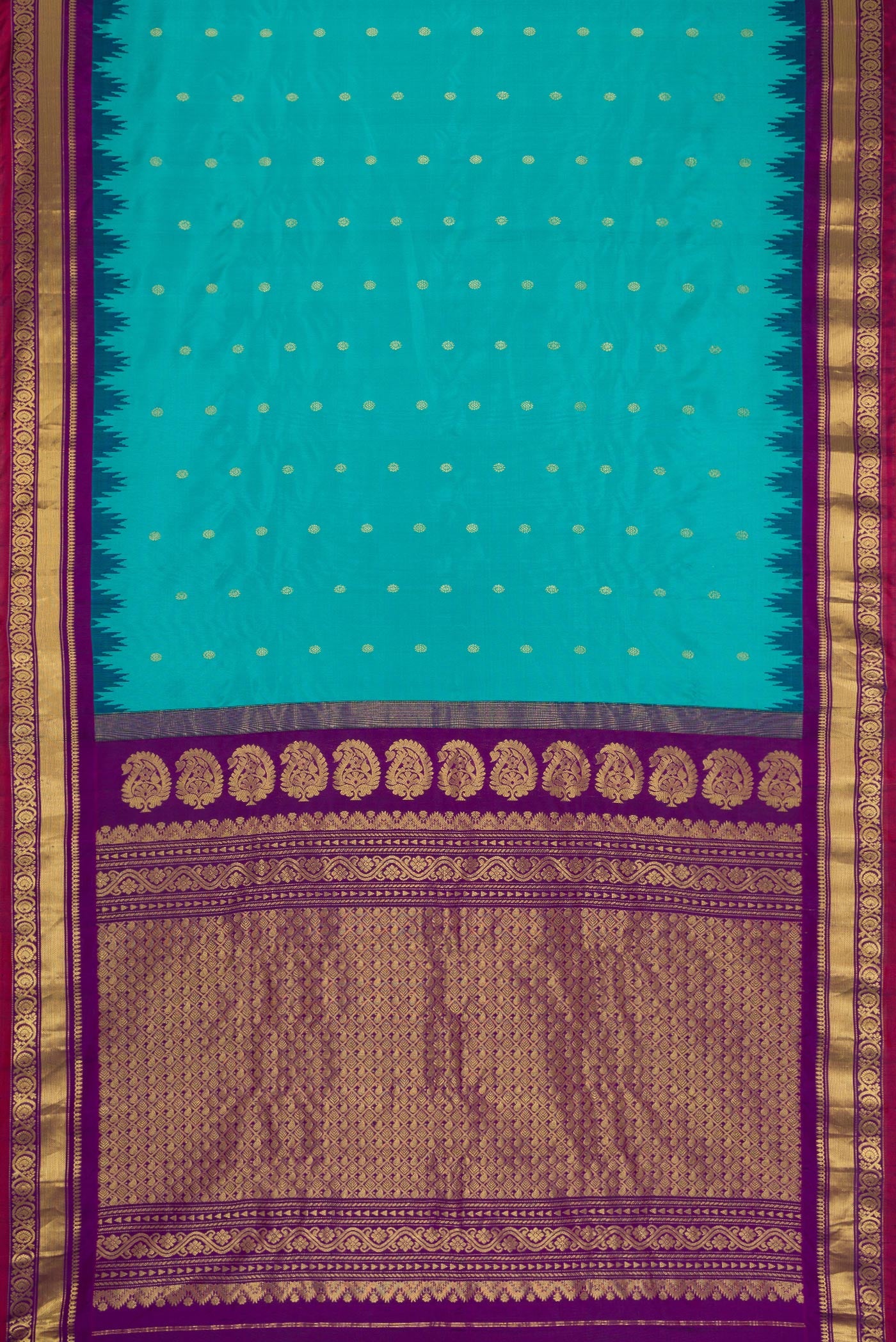 Flat view of Maya Blue Dual Tone Gadwal Silk Saree with Zari Butta on the body and Zari Border. 