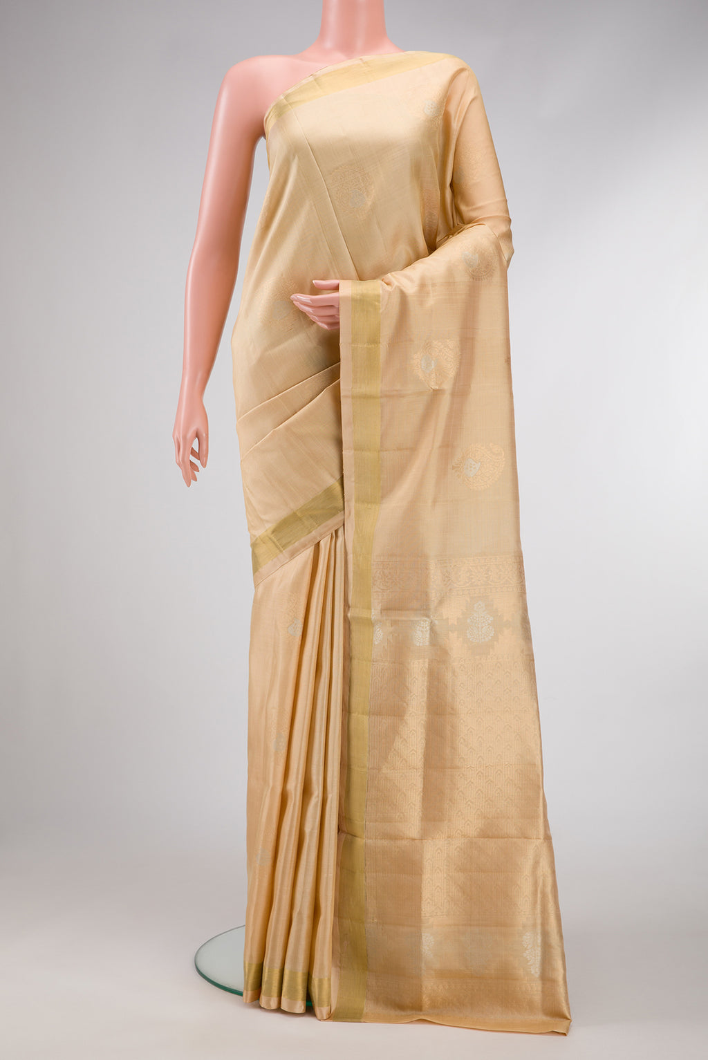 Sandal Dual Tone Soft Silk Saree with Zari Butta on the body and Zari Border.  displayed on a mannequin