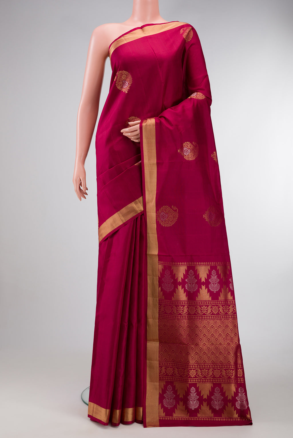 Maroon Dual Tone Soft Silk Saree with Zari Butta on the body and Zari Border.  displayed on a mannequin